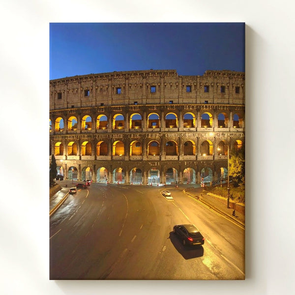 Colosseum Night Canvas – Illuminated Roman Amphitheater with Modern Street
