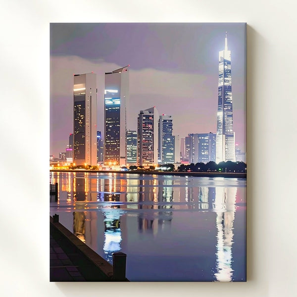 Minimalist Night Cityscape Canvas – Skyscrapers and Reflections on Calm Waterfront