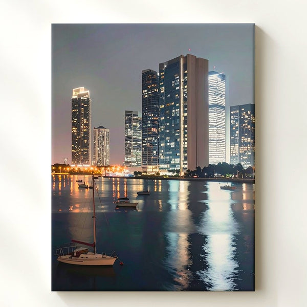 Waterfront Skyline Canvas – Night Scene with Glass Towers and Sailboats
