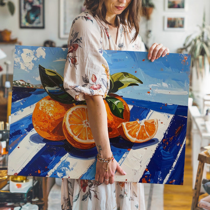 Mediterranean Orange Canvas – Bold Citrus Still Life on Striped Blue Surface - Gifitto