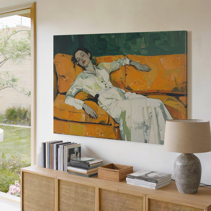 Restful Retreat Canvas – Figurative Art of a Person Reclining on an Orange Couch - Gifitto