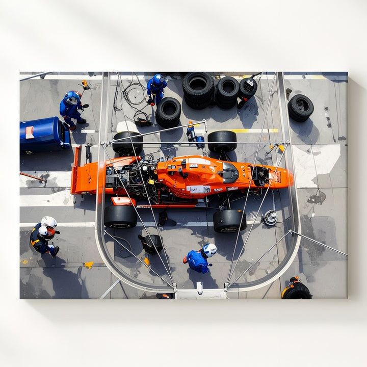 Formula 1 Pit Stop Canvas – High-Action Orange Race Car & Crew Art - Gifitto