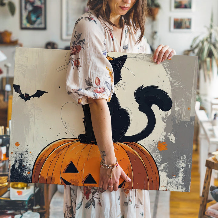 Black Kitten on Pumpkin Canvas – Minimalist Whimsical Halloween Art - Gifitto