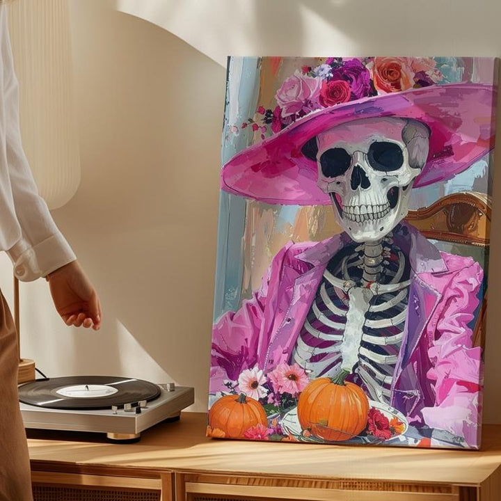 Smiling Skeleton Canvas – Pink Floral Hat & Pumpkin Table Art - Gifitto