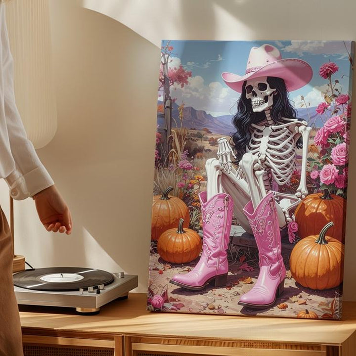 Cowgirl Skeleton in Pink Canvas – Western Halloween Art with Pumpkins & Florals - Gifitto