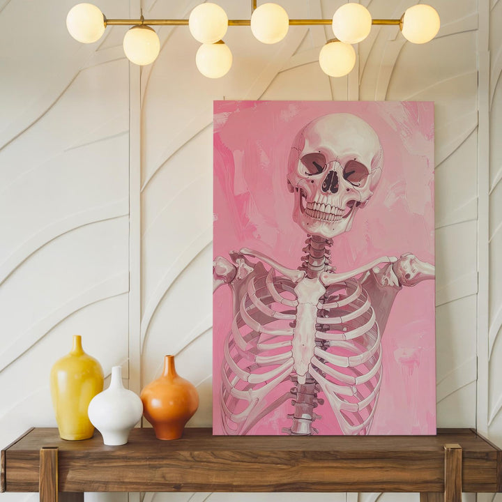 Carefree Skeleton Canvas – Playful Pose & Soft Pink Background Art - Gifitto