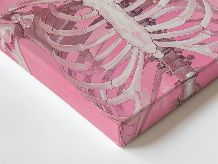 Carefree Skeleton Canvas – Playful Pose & Soft Pink Background Art - Gifitto